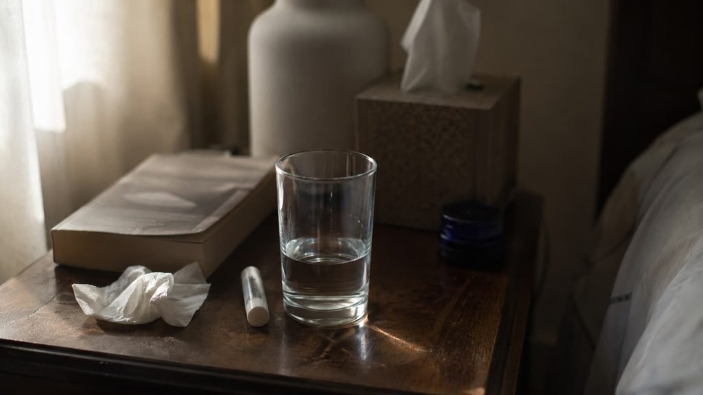 Glass of water for dry mouth relief at night